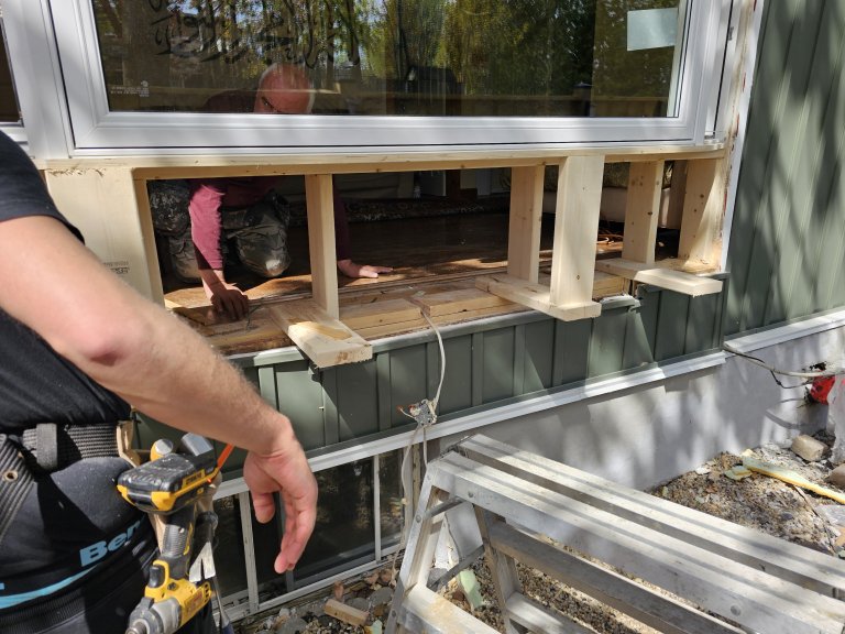Expert structural framing for a new window installation in Simcoe County