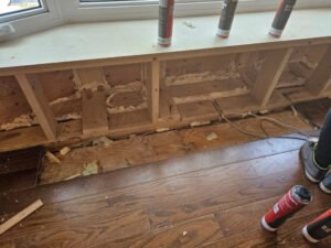 Interior wall and sill area prepared during window installation (interior view) 